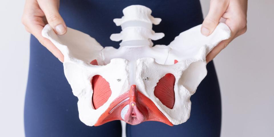 Woman performing pelvic floor exercises at home for bladder control